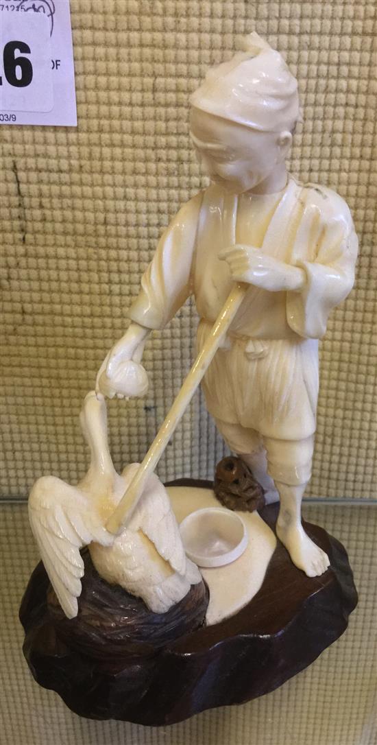 Japanese ivory group of a man and duck